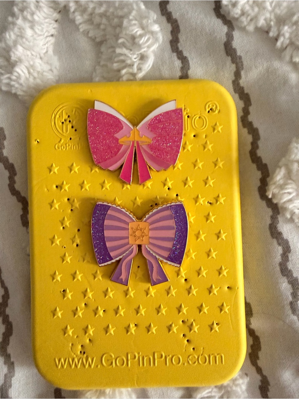 Aurora and Rapunzel glitter bow pin lot